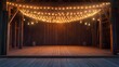 © Ounseng - A rustic wooden theater stage in an old barn with ambient string lights