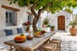 © Lubos Chlubny - Cozy mediterranean patio with fresh fruit displayed on a rustic table