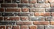 © benjamin - An aged brick wall in a warm rustic tone. The close-up shot emphasizes the texture and character of the material, showcasing its weathered appearance