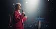 © Gorodenkoff - Portrait of a Caucasian Speaker Coaching Specialists During a Presentation at a Business and Technology Conference. Female Talking About Her Personal Growth Story, Career Path and Opportunities