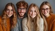 © Evgenii - Four friends are smiling cheerfully while seated indoors, dressed in warm, comfortable sweaters. setting features neutral tones, enhancing their joyful expressions