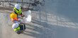 © reewungjunerr - Three Asian engineer working at site of a large building project,Work overtime at construction site,Team of engineer discus at site,The architect, supervisor, and foreman meet to discuss the design
