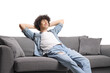 © Ljupco Smokovski - Relaxed young man enjoying on a sofa