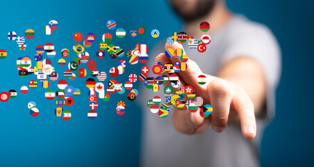 Poster - Person interacting with a digital display of world flags, symbolizing global connection and communication.