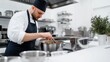 © Larysa - Culinary Artist at Work: A Chef's Passion in the Kitchen, Crafting Exquisite Cuisine with Precision and Flair, a Symphony of Flavors in Every Dish