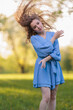 © Tatiana - Beautiful Girl with long hair posing in sunbeams in park