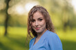 © Tatiana - Beautiful Girl with long hair posing in sunbeams in park