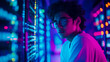 © sommersby - Cybersecurity expert reviewing server data in neon lit datacenter