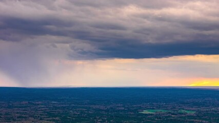 Wall Mural - dense cloudscape over nature landscape. timelapse
