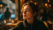 © Lumaverse - A serene young woman with glasses and earbuds listens to music, finding a peaceful moment with her eyes closed in a warm, sunlit cafe