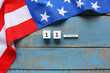 © Pixel-Shot - Calendar with date of National Day of Prayer and Remembrance for the Victims of the Terrorist Attacks on blue wooden background