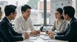 © Harry - Corporate Meeting with Asian Professionals Discussing Strategy in Office