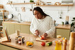 © Bliss - Cooking a fresh and vibrant salad in a modern kitchen with love and care