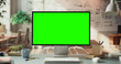 © Gorodenkoff - Green Screen Monitor in Cozy Home Office Setup. Chroma key Display for Digital Content Creation. Transforming Ideas Into e Business Project, Creative Environment. Static Shot