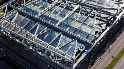 Aufkleber - Sleek modern architecture with glass roof structure, geometric steel beams, and natural daylight reflection, featuring steel