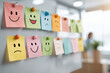 © AnuStudio - Colorful sticky notes with various smiley faces, ranging from happy to sad, are pinned to a glass board in an office setting.