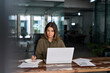 © insta_photos - Busy 40 years old business woman employee or entrepreneur working in office taking notes in office. Businesswoman of middle age account manager executive using laptop computer at work.