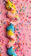 © Dashbow - Colorful ice cream with sprinkles on pink background. Top view.