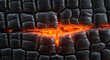 © warsilan - Charred wood texture with fiery glow creating a striking abstract background