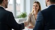 © Deep Stock - Successful Job Interview: Smiling Woman Shaking Hands with HR Manager - Business Agreement and Partnership