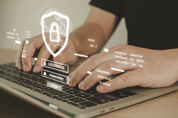 Wall Mural - Login. cyber security engineer working on laptop computer with virtual graphic cybersecurity diagram, cloud computing, anti virus, firewall, data protection, internet network technology concept