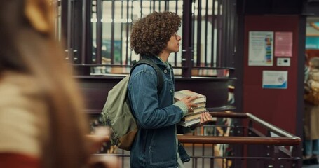 Poster - Man, student and walk with books in library for research, knowledge and information for scholarship. Male person, carry and textbooks for learning, education and studying resources for admission test