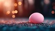 ©  zikakant - This artistic close-up of a vibrant pink egg resting on textured gravel showcases bold colors and is symbolic of new beginnings, creativity, and the joy of seasonal festivities.