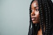 © Vadym - Close-up portrait of young black woman with box braids hairstyle. Beautiful female with perfect skin. Braided hair, stylish coiffure, pro hair styling. Beauty, fashion and hair care concept.