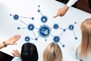 Aufkleber - A group of business professionals collaboratively discuss tax strategies while analyzing data visualizations on a modern office table. Engaging discussion fosters innovative ideas. Amity
