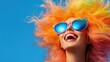 © Larisa AI - This vibrant image captures a joyful woman with colorful rainbow hair wearing stylish sunglasses against a bright blue background, embodying happiness and creative self-expression.