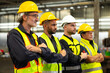 © NVB Stocker - Arms crossed. Professional team working at workplace. Unity and teamwork concept. Portrait engineer factory manager worker and mechanic team together in factory workplace