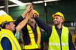 © NVB Stocker - team hands together. Professional team working at workplace. Unity and teamwork. Group portrait engineer factory manager worker and mechanic team together in factory workplace