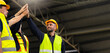 © NVB Stocker - team hands together. Professional team working at workplace. Unity and teamwork. Group portrait engineer factory manager worker and mechanic team together in factory workplace