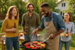 © Firuza - Friends enjoying a barbecue party together.