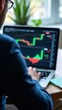 © useful pictures - Businessman using laptop for analyzing data stock market. Forex trading graph concept. Trading forex data information..
