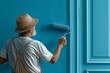 © Julia - Person painting interior doors, focused on detail, bright colors enhancing interior design. Concept of person painting interior doors, engaging in creative home improvement process.
