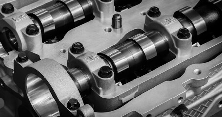 Aufkleber - A close-up of car engine showing cylinders and pistons. engine made metal and has shiny, metallic appearance auto service concept background