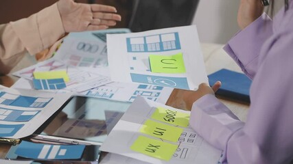 team of UI UX web designer are working together to develop mobile responsive websites with UI UX front end designer previews