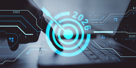 Fototapete - Person touching laptop keyboard with futuristic digital 2026 target interface on dark background representing technology goals concept.