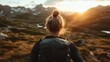 © Lazar - A silhouette of an adventurer stands against a breathtaking sunset, embodying the spirit of exploration and discovery in the majestic mountains, inspiring wanderlust and adventure.
