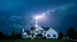 © ANNISA - Dramatic Lightning Strikes Above a Suburban Residence at Night