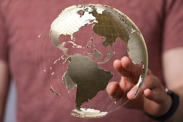 Poster - A hand interacts with a transparent 3D globe, showcasing global connectivity and technology.