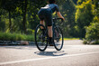 © lzf - Asian woman cycling in the summer park