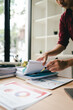 © Dino - Employees who work with a lot of documents Searching for documents Accounting for income, expenses, tax records, and hard work