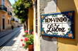 © PrismaVibe Studio  - Decorative ceramic tile sign reading 'Bem Vindo a Lisboa' placed in front of a scenic view with traditional Lisbon houses