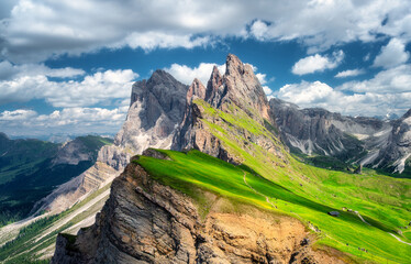 Wall Mural - aerial view of seceda mountain in summer in dolomites, italy. colorful landscape with mountain peaks