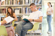 © JackF - In reading room, young students sit in chairs and read books. Pupils in university library get acquainted with scientific works of scientists, study modern technical publications.