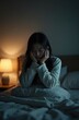 © Vadym - Asian woman in bed suffering from depression anxiety and insomnia. Female feels sad, tired, worried, cannot sleep. Mental health crisis. Emotional distress. Night time, lonely home.