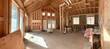 © Rob and Julia Campbell/Stocksy - Framing and studs of new build construction.