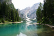 © Jelena Sijak/Stocksy - Scenic view of Lago di Braies surrounded by majestic mountains